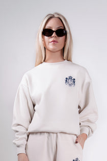 Quiet luxury crest crewneck in cream by Thorne Estate