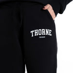 Close-up detail of Thorne Estate varsity sweatpant logo