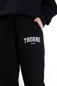 Close-up detail of Thorne Estate varsity sweatpant logo